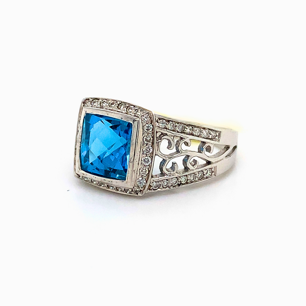10kt White Gold Blue Topaz + Diamond ring