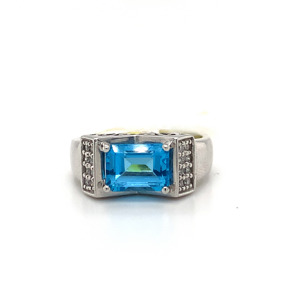 10kt White Gold Blue Topaz + Diamond ring