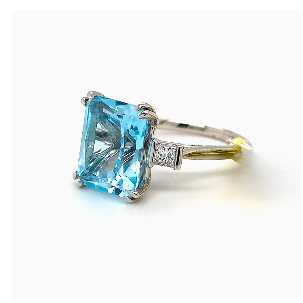 10kt White Gold Sky Blue Topaz + Diamond ring