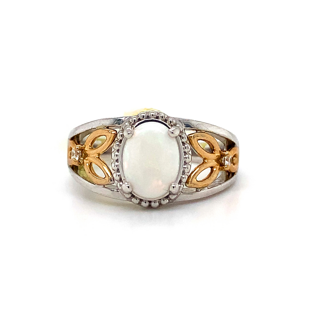10kt Oval Shape Opal Two -Tone Gold + Diamond ring