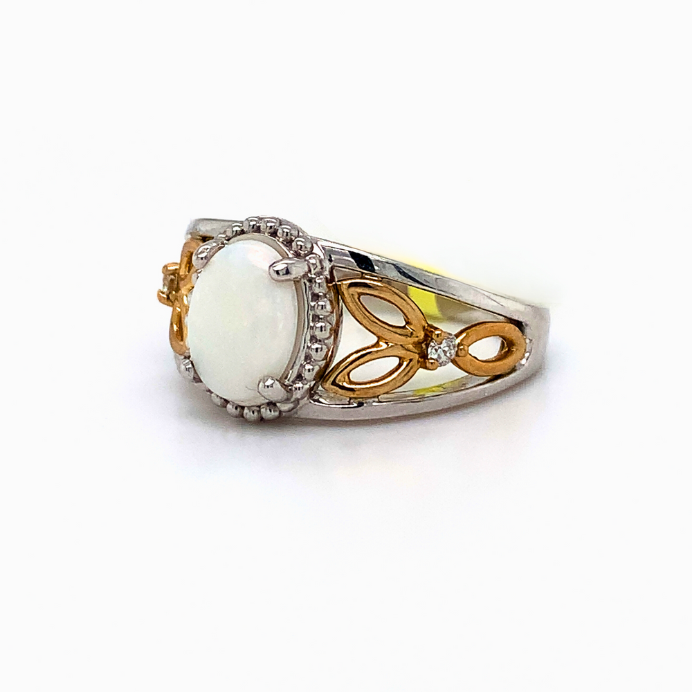 10kt Oval Shape Opal Two -Tone Gold + Diamond ring