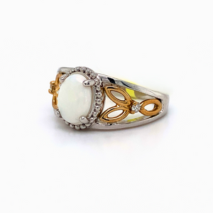 10kt Oval Shape Opal Two -Tone Gold + Diamond ring
