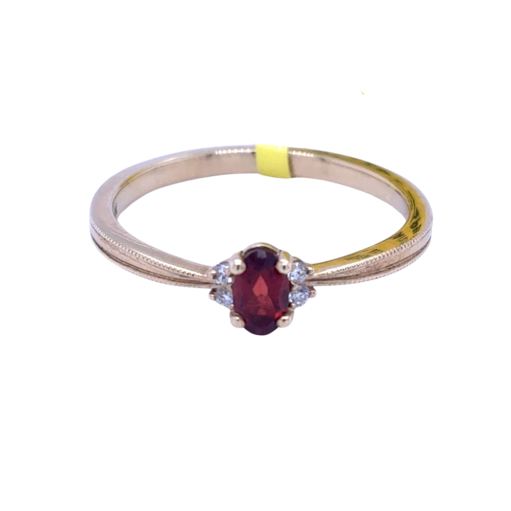 10kt Yellow Gold 5X3MM Garnet +.03TW Diamond Ring