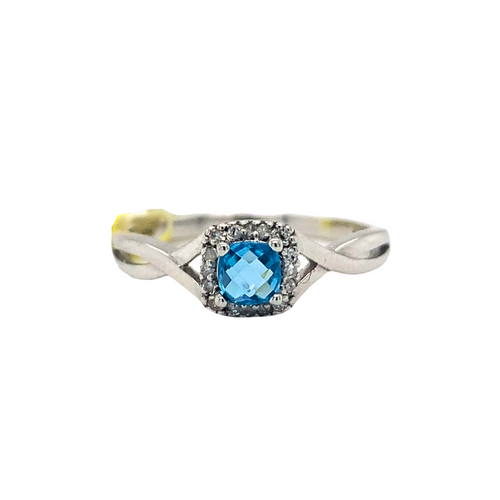 10kt White Gold Blue Topaz ring + diamonds