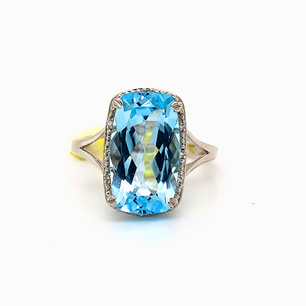 10kt White Gold Sky Blue Topaz + Diamond ring