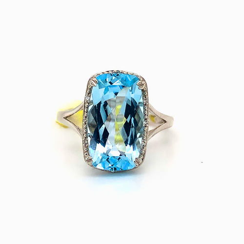 10kt White Gold Sky Blue Topaz + Diamond ring