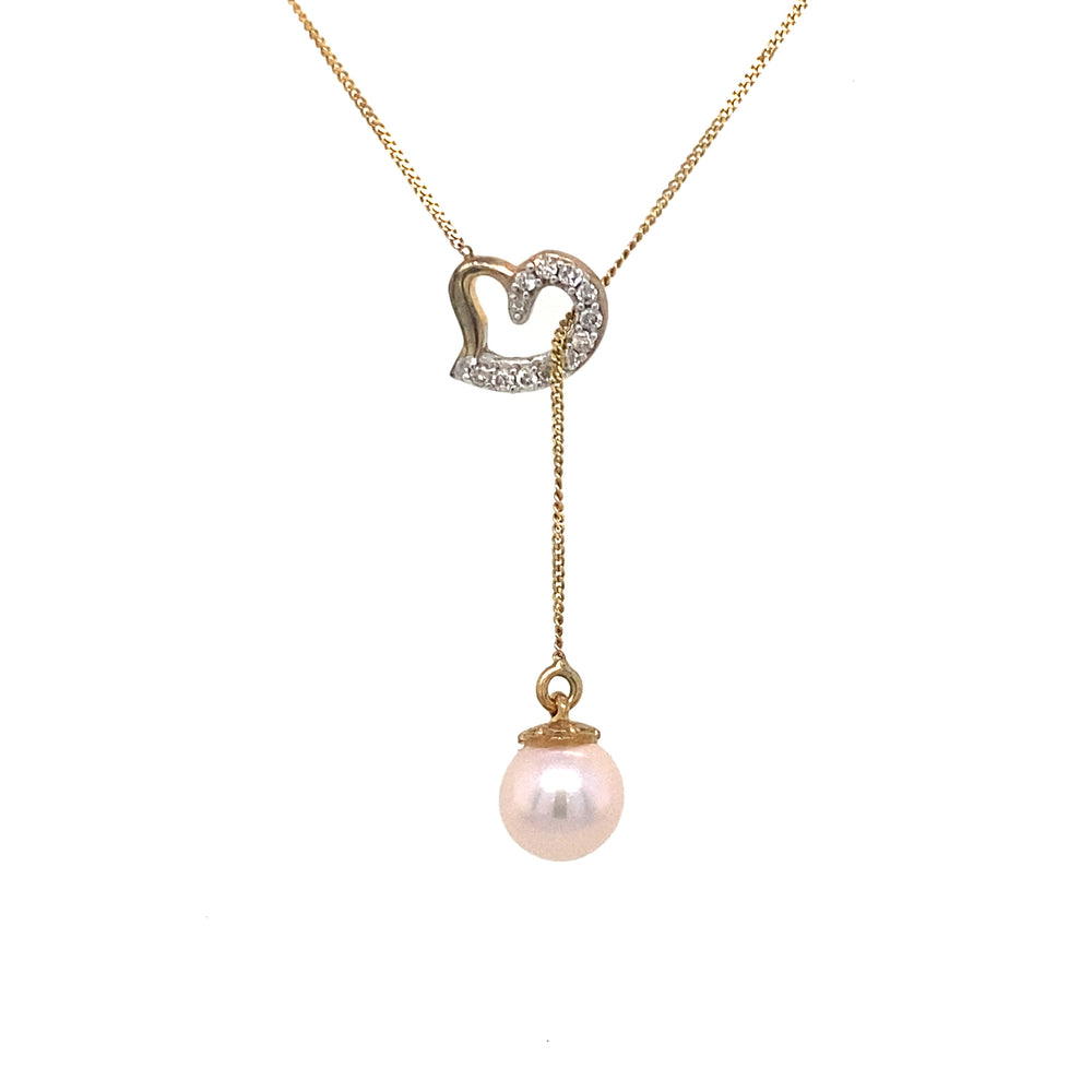 10KT yellow gold Pearl + Diamond pendant