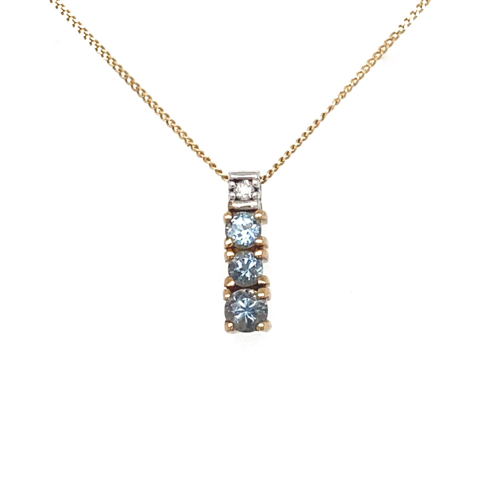 10K Yellow gold Aquamarine + Diamond pendant