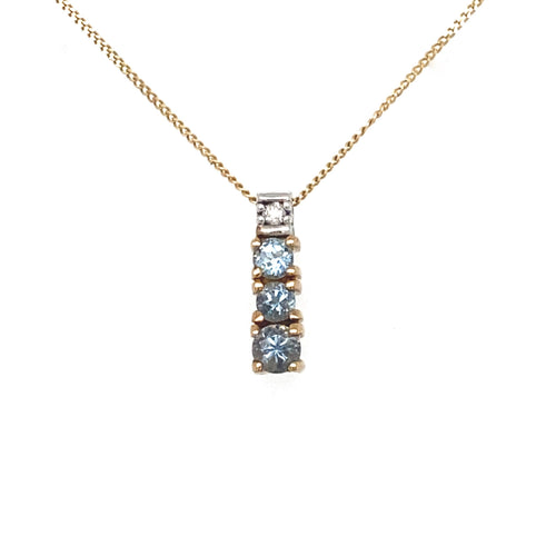10K Yellow gold Aquamarine + Diamond pendant