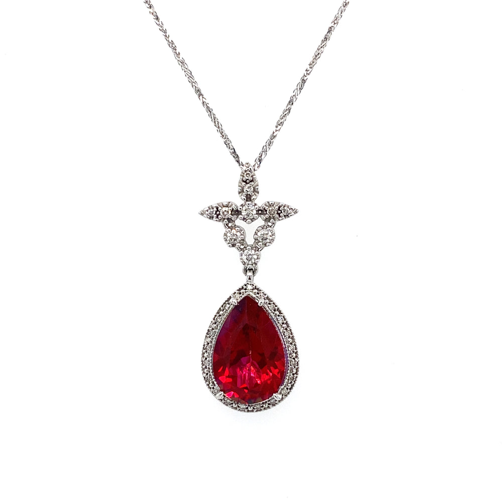 10kt 15X10 Rose Quartz+ 0.26TDW Pendant