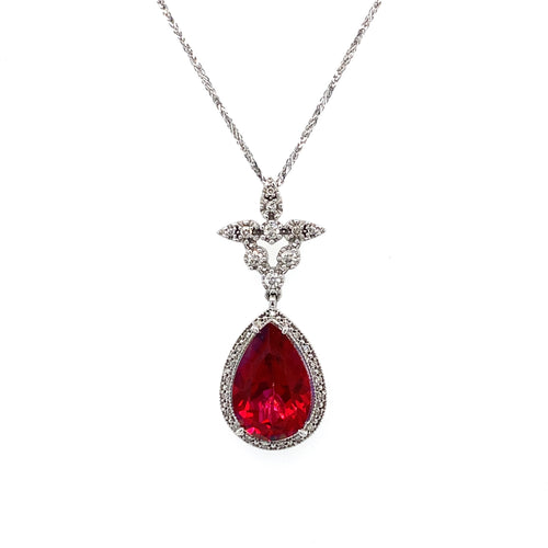 10kt 15X10 Rose Quartz+ 0.26TDW Pendant